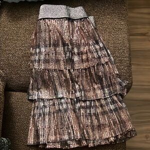 These playful mini skirts feat a charming bubble style w/ tiered ruffles + more